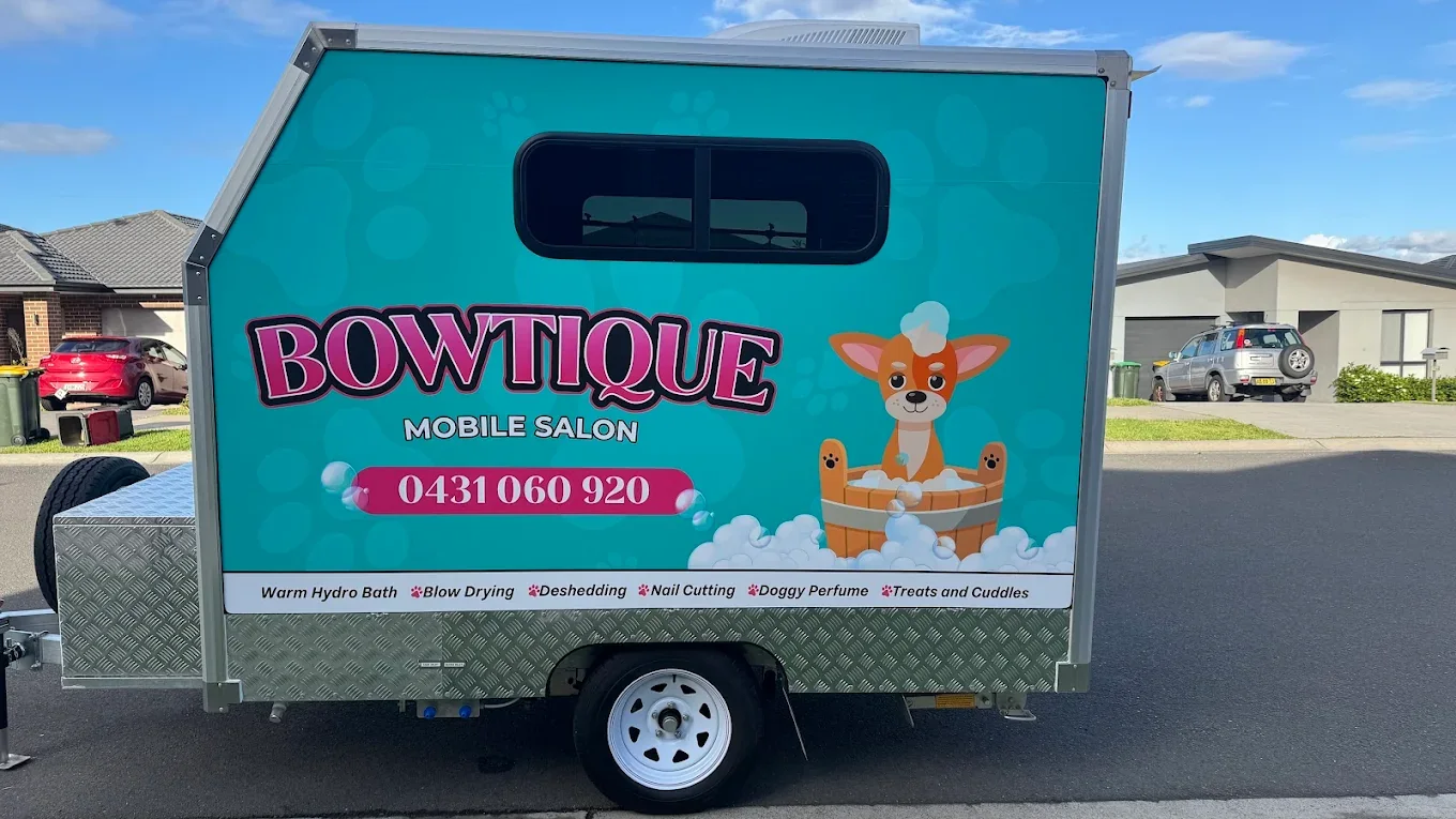 The Bowtique Mobile Salon grooming van parked at a Macarthur home